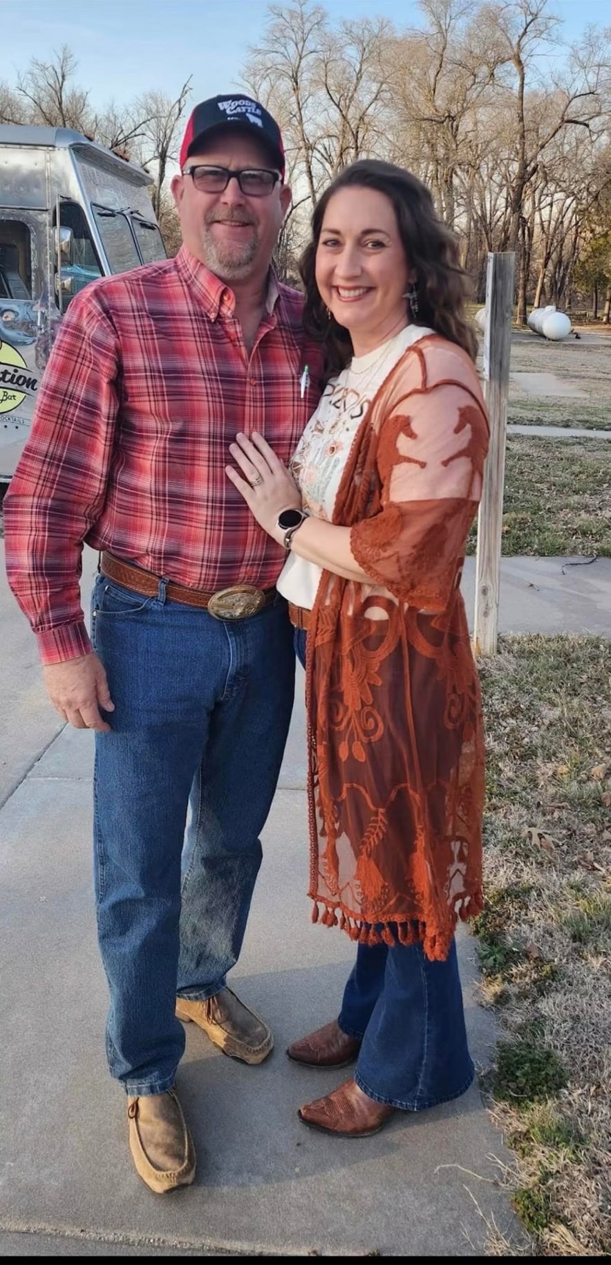 Woods Cattle owners standing together
